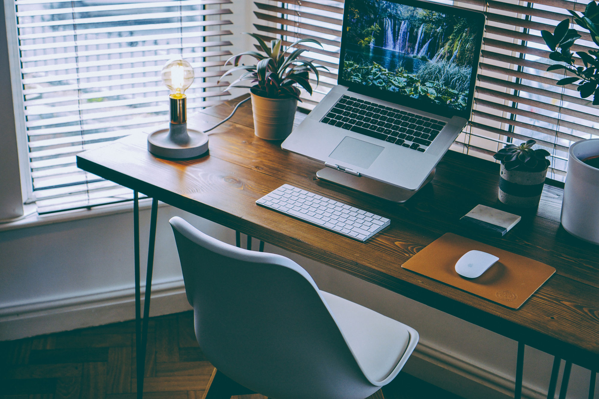 Desk with computer and smartphone